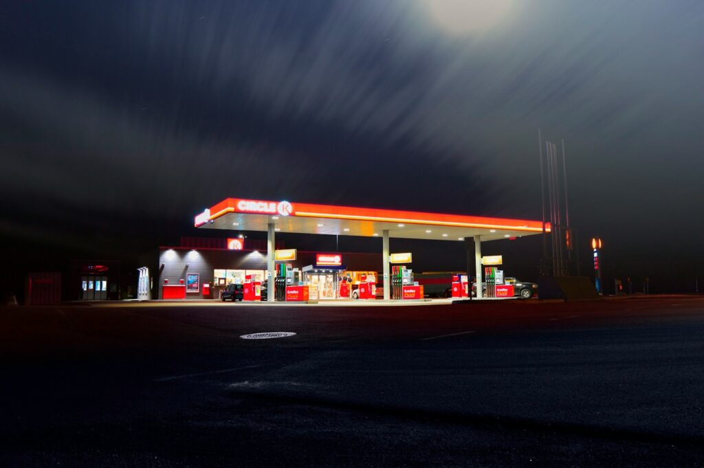 The Petroleum Industry: How Refined Petrol Reaches Your Vehicle 4 Circle gas station along the road during night time